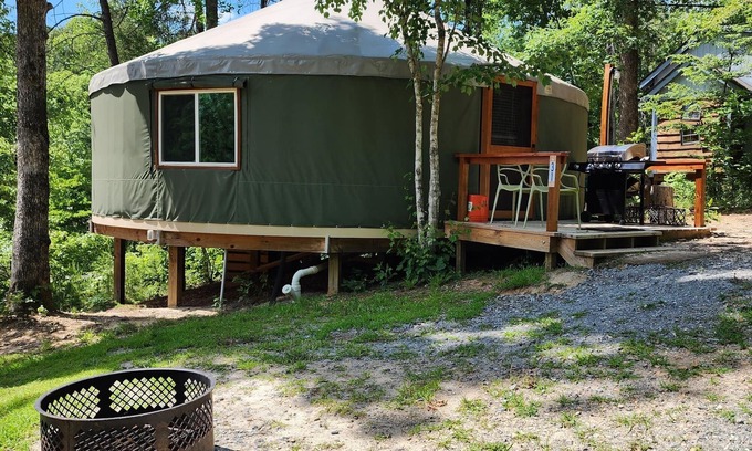 Mill Spring House | Dog friendly 30' Yurt, large dome skylight, king bed, 2 bedrooms, sleeps 6.