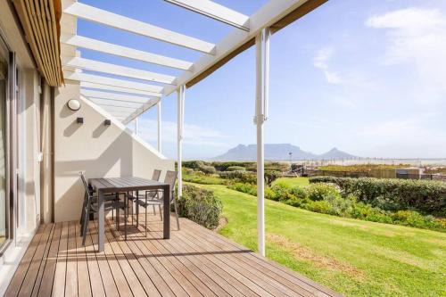 Bloubergstrand Apartment | Beachfront Bliss: Dolphin Beach E4 Cabana for 4 Guests