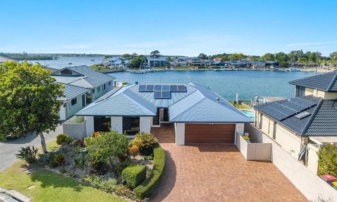 Yamba House | Discover Dolphin Waters - Ideal Family Waterfront Retreat