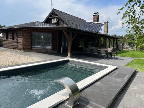 Milicz House | Discover Dom Przy Lesie: Oceanfront Paradise with Pool