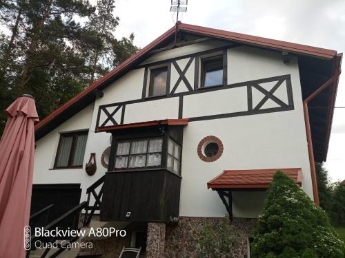 gmina Biskupiec House | Family-Friendly Retreat at Dom w Gaju by Lake Dębno