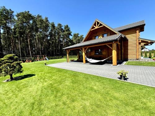 Karwienskie Bloto Drugie House | Exclusive Getaway at Dom Wakacyjny Złoto Północy, 9.8/10