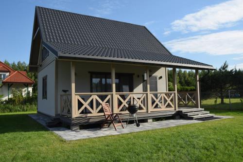 Ostroda Apartment | Inviting Domek Kątno: 4-Star Stay with Family-Friendly Amenities