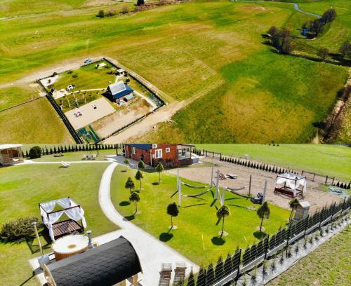 Swietajno House | Inviting Domek z basenem: Beachfront Oasis in Mazury