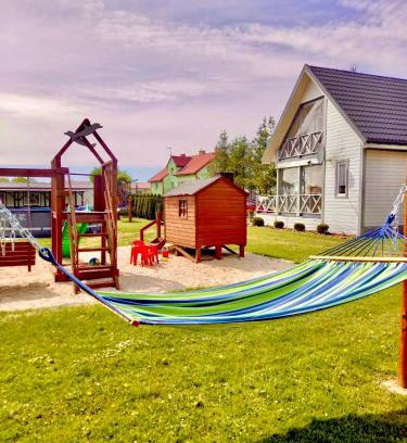 Postomino Cabin | Pet-Friendly Domki w Rusinowie u Gosi with Ocean Views