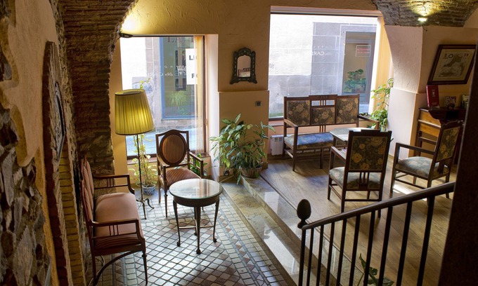 San Juan Hotel | Discover Don Carlos Cáceres: Family-Friendly & Spa Amenities