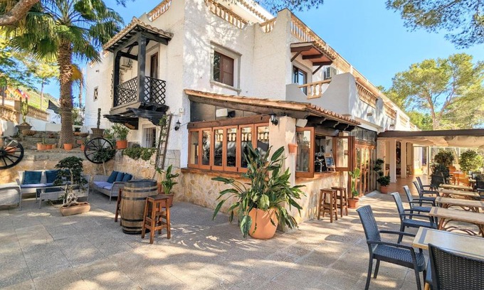 Peguera Hotel | Charming Don Carlos: Oceanfront Stay with Pool Access