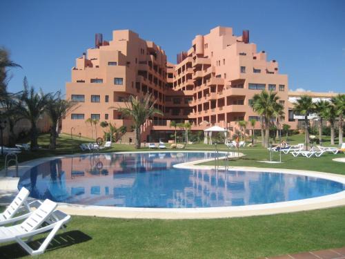 Puerto de la Duquesa Apartment | Beachfront Bliss at Don Juan Beach Resort - 4-Star Retreat