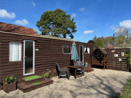 Carrigans Ski Chalet | Relaxing Donegal Cabin with Hot Tub & Guest Rated 9.8