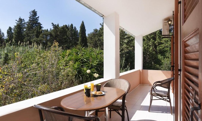 Agios Georgios Pagon Apartment | Family-Friendly Dora Apartment Pagoi 1 - A Cozy Retreat