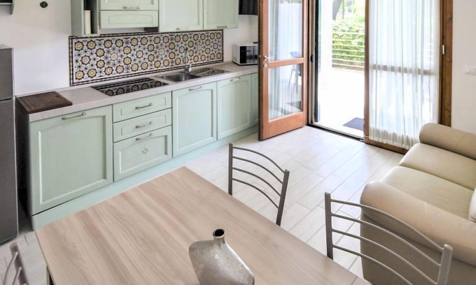 Lido di Volano House | Dora by Interhome: Oceanfront Stay with Spa & Breakfast