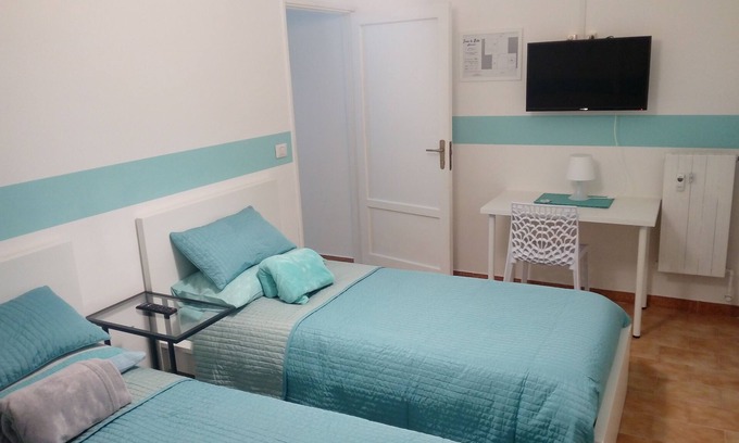 Ivrea House | Cozy Dora Room with Shared Bath at Ivrea la Bella Guest House