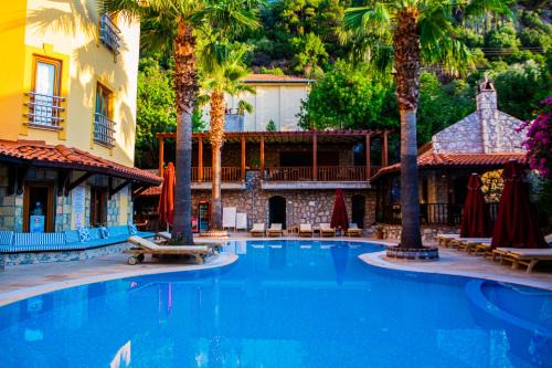 Turunc Apartment | Oceanfront Oasis at Dores Residence - 4-Star Retreat