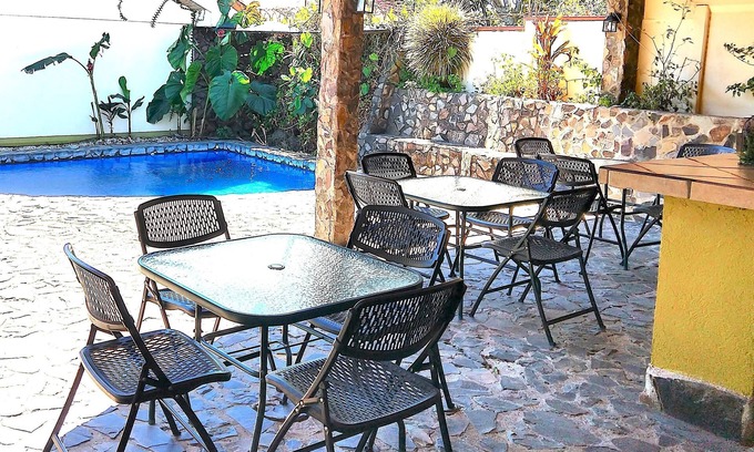Cacique Hotel | Discover Dos Palmas Studio Apartments: Rated 9.6/10 with Pool & Spa