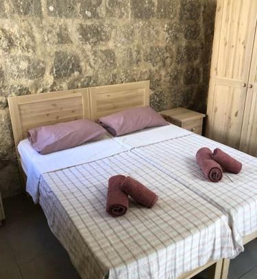 Nadur House | Relax by Double Heated Pools with Oceanfront Views