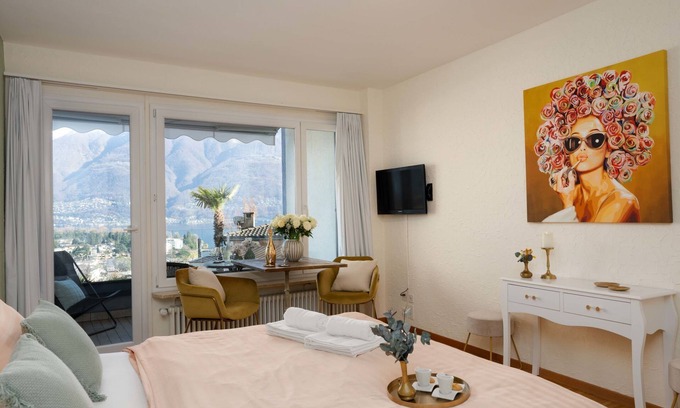 Ascona Apartment | Elegant Double Room Classic with Lake View & Spa Access