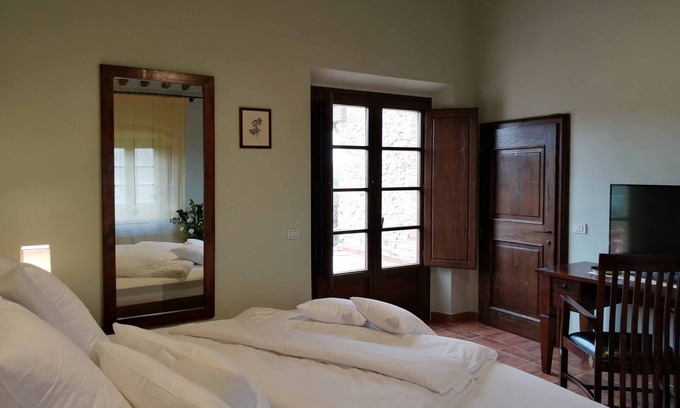 Sassetta Apartment | Inviting Double Room with Terrace for Memorable Getaways
