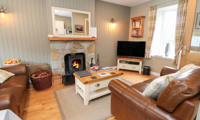 Newtonmore Cottage | DOUGLAS FIR, pet friendly, with open fire in Newtonmore