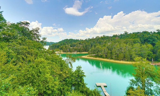 Sevierville Cabin | Charming Lakefront Cabin with Deck and Pool Access