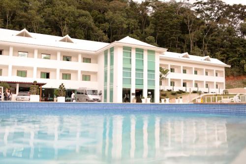 Pedra Dourada Hotel | Relax at Dourada Parque Hotel with Pool and Ocean Views