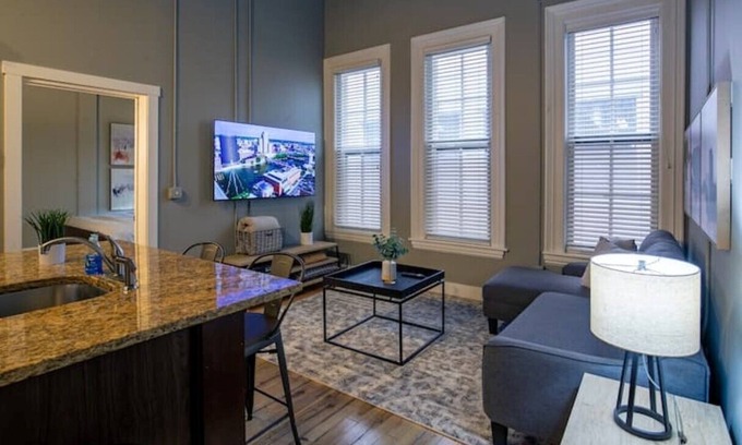 Grand Rapids Apartment | Downtown Loft Retreat: King Bed & Family-Friendly Amenities