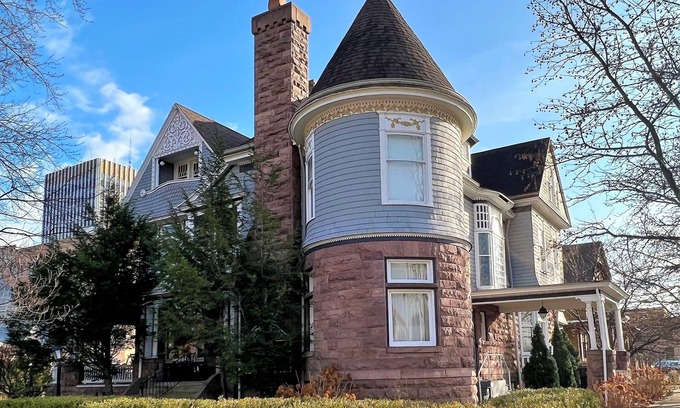 West Washington House | Elegant Downtown Mansion Steps from Notre Dame with Ocean View