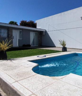Mar del Plata Apartment | Stunning Faro Apartment with Pool, Steps from the Beach