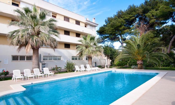 Cala Agulla Apartment | Drac Blanc 1-4: Family-Friendly Escape with Pool Retreat