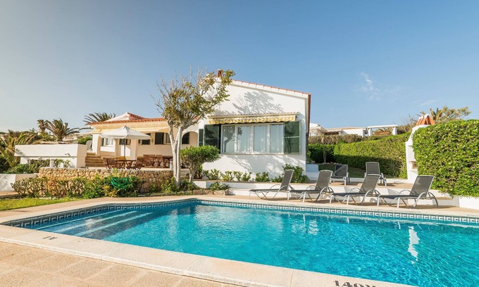 Sant Lluis Villa | Idyllic Villa El Guerito: Oceanfront Retreat with Pool