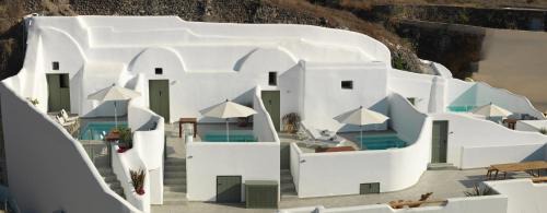 Messaria Apartment | Elegant Drops Cave Houses: Oceanfront Bliss & Spa Retreat