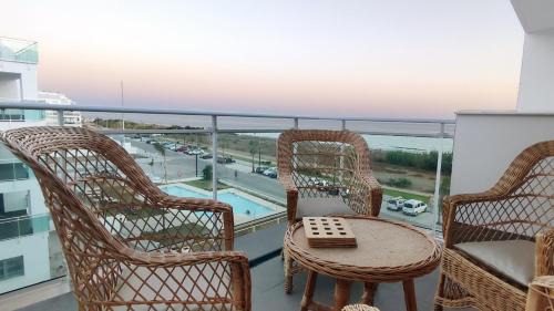 El Morche Apartment | Beachfront Dunas Apartment with Pool & Ocean Views