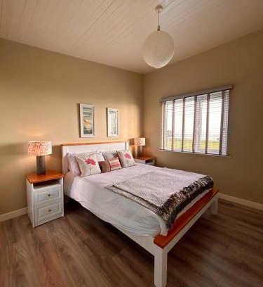 Dunmore East Cabin | Oceanfront Bliss: Dunmore East Suite with Stunning Views