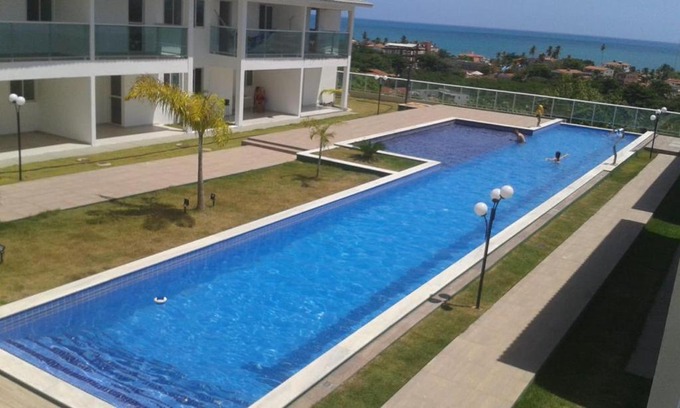 Village Jacuma Apartment | Duplex Bangalo 02: Pet-Friendly Escape with Ocean Views