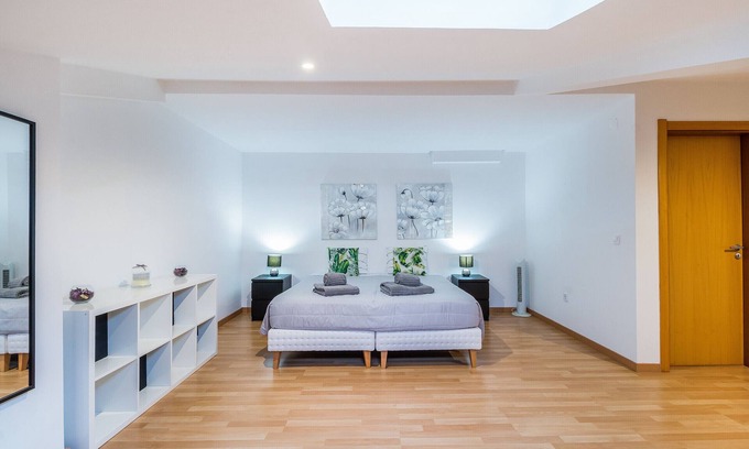 Areias de Sao Joao Apartment | Elegant Duplex Near Oura Beach with Pool and Spa Access