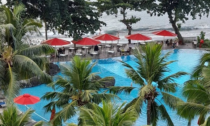 Arue Apartment | Beachfront Duplex with Pool, Sauna & Fitness Center