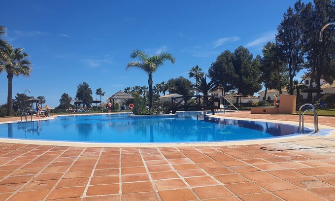 Castillo de Sabinillas Apartment | Exceptional Duquesa Suites Blue: Poolside Escape to the Beach