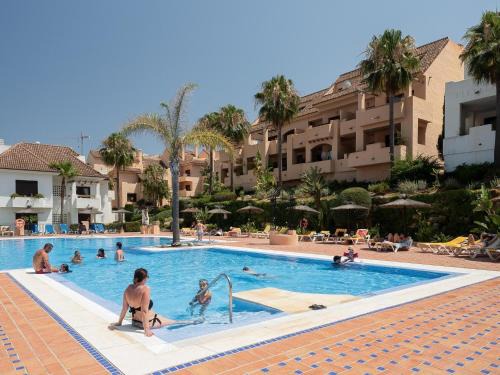 Castillo de Sabinillas Apartment | Duquesa Village: Oceanfront Haven with Pool & Hot Tub