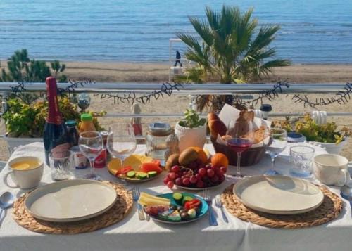 Rade Apartment | Oceanfront Escape at Durres Strand with Spa & Dining