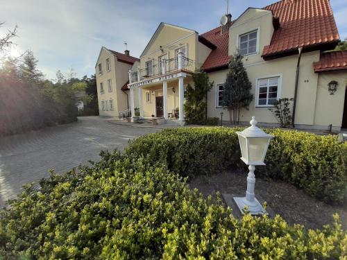 Orlinki Bed & Breakfast | Oceanfront Escape at Dworek Bursztynowe Piaski, Rated 9/10