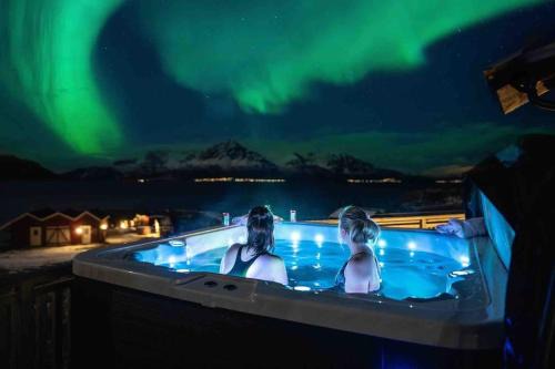 Dyroy Municipality Villa | Dyrøy Holiday Lodge: Relax with Jacuzzi & Pet Friendly Perks