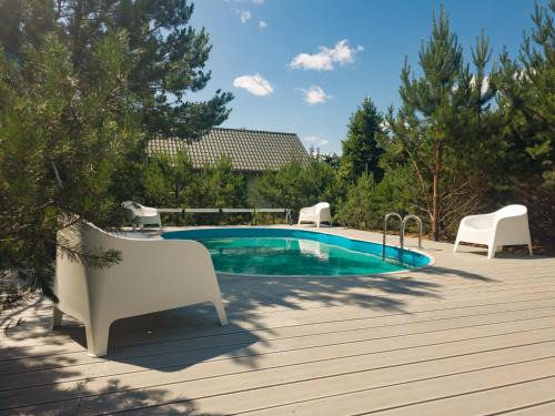 Sominy Cabin | Dywanowy Zakątek: Pet-Friendly Oasis with Ocean Views