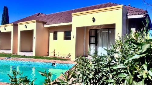 Klerksdorp House | Cozy Dzana Guesthouse with Pool & Family-Friendly Vibes
