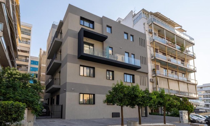 Nea Smirni Apartment | Discover Earos Urban Living: Family-Friendly & 4-Star Excellence