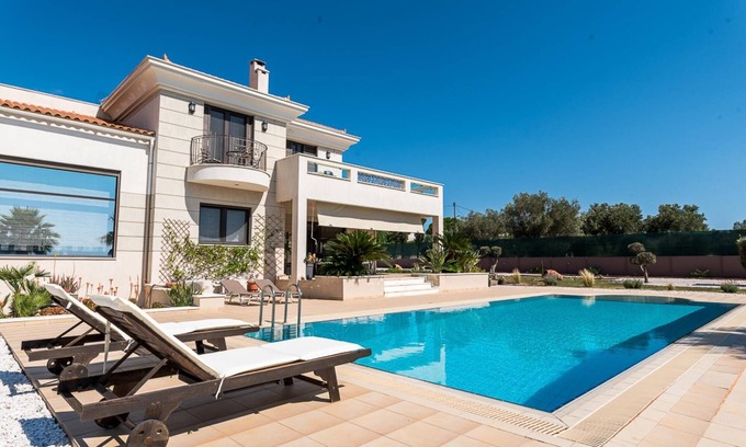 Palaia Fokaia Villa | Elegant East Coast Mansion with Private Pool & Spa Amenities