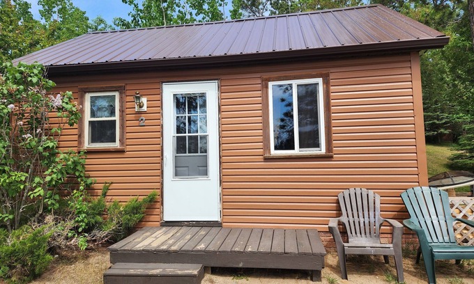 Nevis Resort | Cozy East Crooked Lake Cabin with Pool and Spa