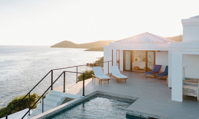 Cotton Valley Shores Villa | Relax at East End Ocean Front: Infinity Pool & Sunkissed Villa