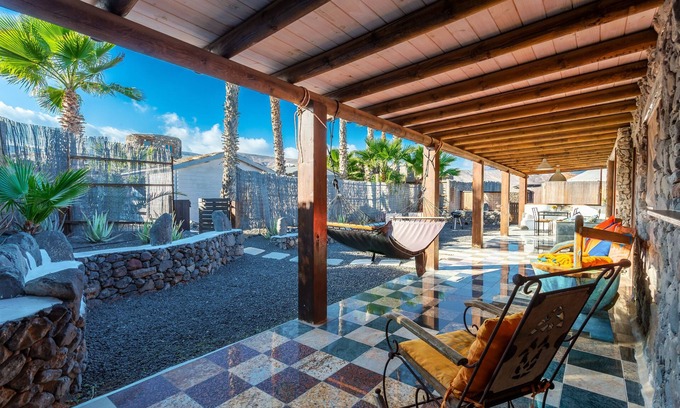 Haria House | Family-Friendly Eco Barn with Pool, Steps from Golden Beach