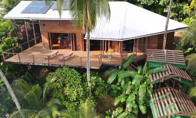 Bouvet Island House | EcoHouse: Nature Retreat with Scenic Caribbean Sea Views