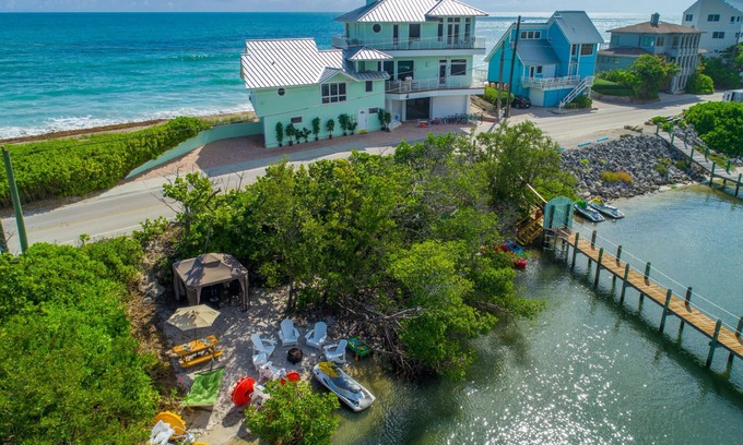 Stuart House | Beachfront Bliss at Eden Beach: Hot Tub & Dock Await!