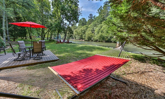 Ellijay Cabin | Edgewater Dreams - Riverfront Retreat with Dog-Friendly Hot Tub